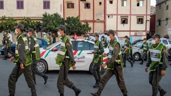 Members of Morocco's Interior Ministry Auxiliary Forces patrol a neighbourhood to enforce the reimposed lockdown due to a spike in coronavirus (COVID-19) cases, in the capital Rabat's district of Takadoum on August 17, 2020. (Photo by FADEL SENNA / AFP) (Photo by FADEL SENNA/AFP via Getty Images)