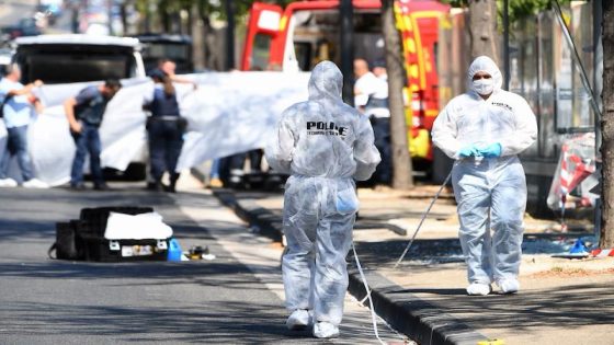 (FILES) In this file photo taken on August 21, 2017 A white sheet is erected as a body of a victim is evacuated to a waiting ambulance while French forensic police officer search the site following a car crash in the southern Mediterranean city of Marseille. - A total of 293 people died in May 2022 on the roads of mainland France, up 21% compared to the same month in 2019, the reference year before the pandemic, the French road safety authority announced on June 21, 2022. (Photo by boris HORVAT / AFP)